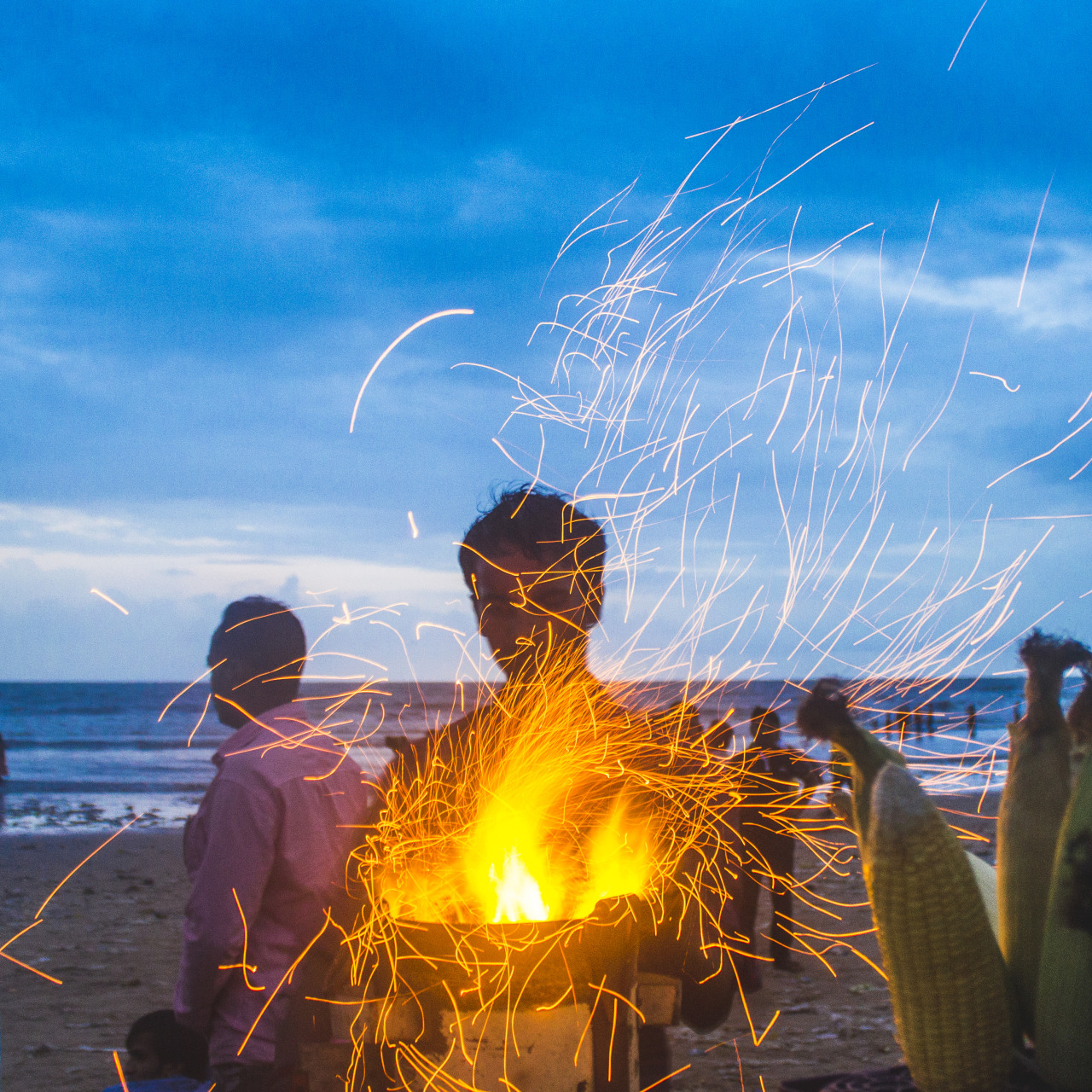 A corn seller at Juhu beach. Freshly roasted corn is a popular snack across Mumbai during the monsoons. For the many who work here at the beach, holidays mean a surge in business, as families and friends put the daily rush of their lives on pause to...